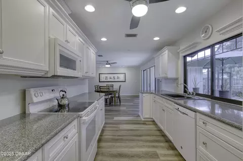 Kitchen - 1300 Oak Forest Dr, Ormond Beach, FL 32174 photo 4 of 5