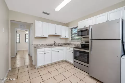 Kitchen - 59 Cardinal Dr #A, Ormond Beach, FL 32176 photo 1 of 2