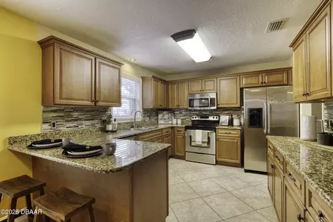 Kitchen - 22 Forestview Way, Ormond Beach, FL 32174 photo 4 of 6