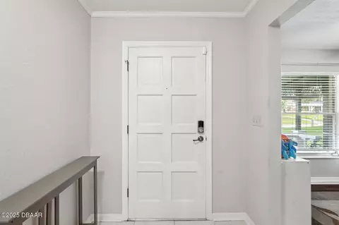 Entry Way - 320 Rio Pinar Dr, Ormond Beach, FL 32174 photo 2 of 3