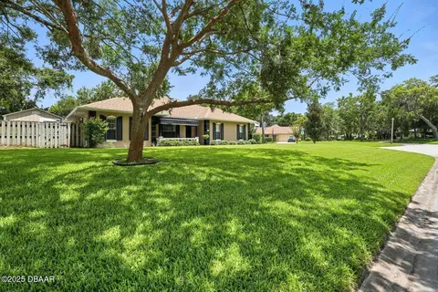Exterior - 320 Rio Pinar Dr, Ormond Beach, FL 32174 photo 6 of 12