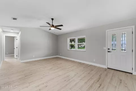 Living - 2225 Pine Tree Dr, Edgewater, FL 32141 photo 2 of 7