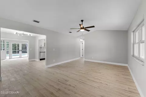 Living - 2225 Pine Tree Dr, Edgewater, FL 32141 photo 1 of 7