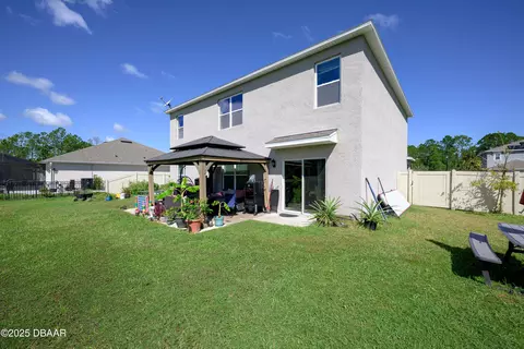 Exterior - 281 Sunset Point Dr, Ormond Beach, FL 32174 photo 2 of 11