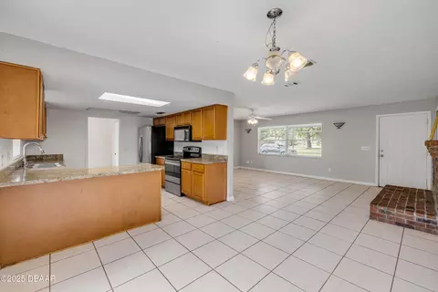 Living - 3132 Pine Tree Dr, Edgewater, FL 32141 photo 6 of 6
