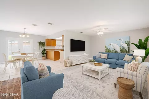 Living - 3132 Pine Tree Dr, Edgewater, FL 32141 photo 1 of 6
