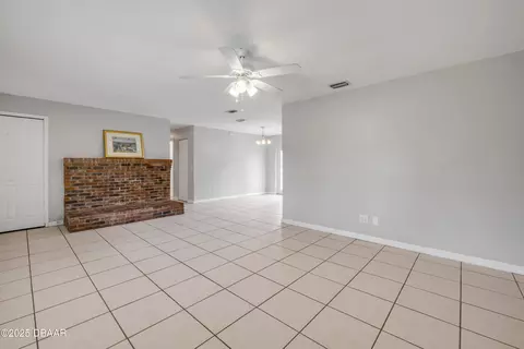 Living - 3132 Pine Tree Dr, Edgewater, FL 32141 photo 4 of 6
