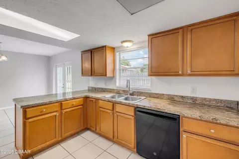 Kitchen - 3132 Pine Tree Dr, Edgewater, FL 32141 photo 3 of 5
