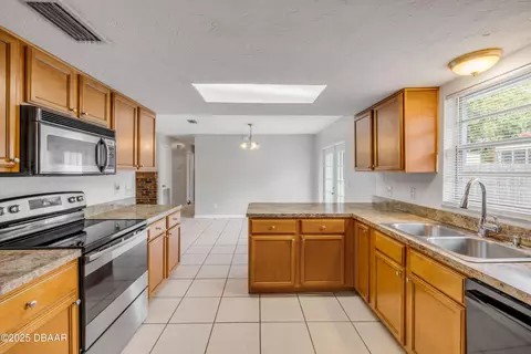 Kitchen - 3132 Pine Tree Dr, Edgewater, FL 32141 photo 5 of 5