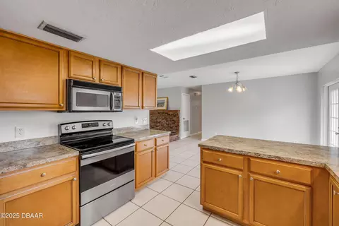 Kitchen - 3132 Pine Tree Dr, Edgewater, FL 32141 photo 4 of 5
