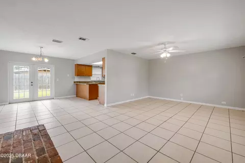 Living - 3132 Pine Tree Dr, Edgewater, FL 32141 photo 3 of 6