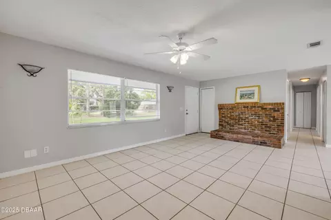Living - 3132 Pine Tree Dr, Edgewater, FL 32141 photo 5 of 6