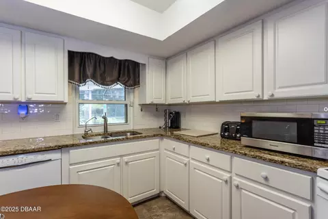 Kitchen - 7 Rocky Creek Trl, Ormond Beach, FL 32174 photo 3 of 5