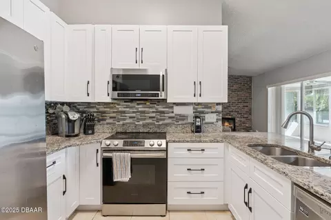 Kitchen - 6516 Moonshell Ct, Orlando, FL 32819 photo 1 of 4