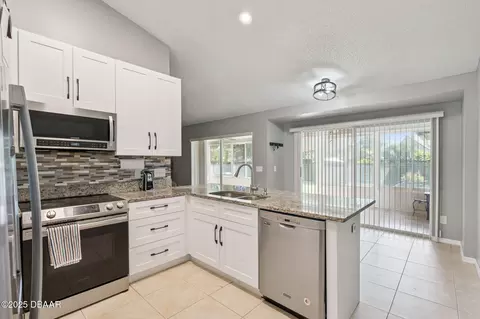 Kitchen - 6516 Moonshell Ct, Orlando, FL 32819 photo 2 of 4