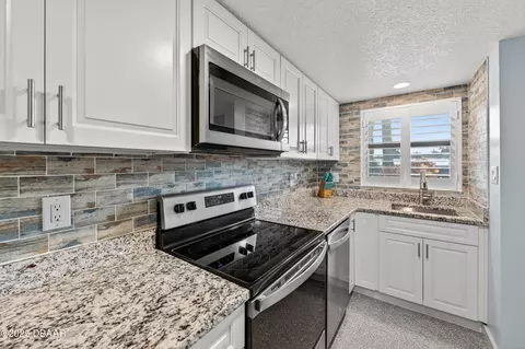 Kitchen - 3100 Ocean Shore Blvd, Ormond Beach, FL 32176 photo 1 of 2