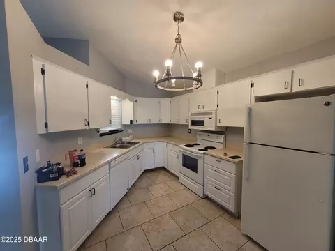 Kitchen - 471 Hammock Ln, Ormond Beach, FL 32174 photo 2 of 3