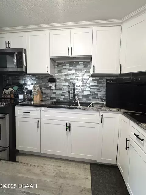 Kitchen - 409 Adele St, Edgewater, FL 32132 photo 1 of 1