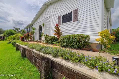 Exterior - 611 Portside Ln, Edgewater, FL 32141 photo 3 of 8