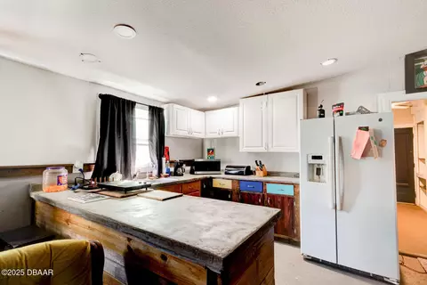 Kitchen - 3051 Ragis Rd, Edgewater, FL 32132 photo 6 of 6