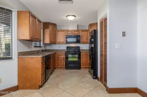 Kitchen - 909 Brookside Dr, Ormond Beach, FL 32174 photo 1 of 2