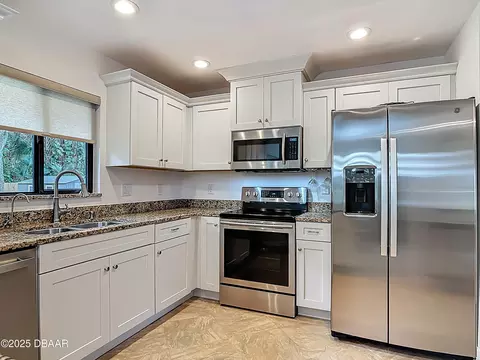 Kitchen - 3410 Mango Tree Dr, Edgewater, FL 32141 photo 4 of 7