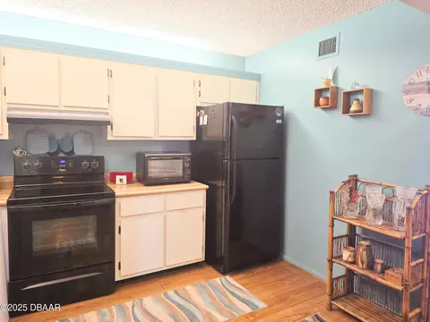 Kitchen - 6495 Chasewood Dr, Jupiter, FL 33458 photo 2 of 2