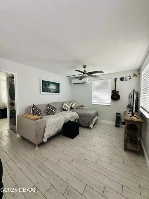 Living - 49 Alamanda Dr, Ormond Beach, FL 32176 photo 2 of 2