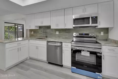 Kitchen - 1411 N Beach St, Ormond Beach, FL 32174 photo 2 of 3