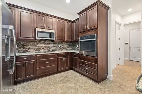 Kitchen - 829 Pinewood Dr, Ormond Beach, FL 32174 photo 3 of 5