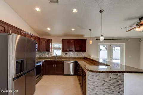 Kitchen - 5 Sand Dollar Dr, Ormond Beach, FL 32176 photo 2 of 2