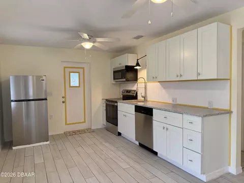 Kitchen - 302 Adele St, Edgewater, FL 32132 photo 4 of 11