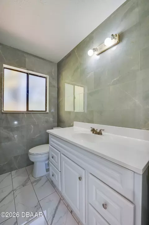Bath - 322 Canal Rd, Edgewater, FL 32132 photo 2 of 3