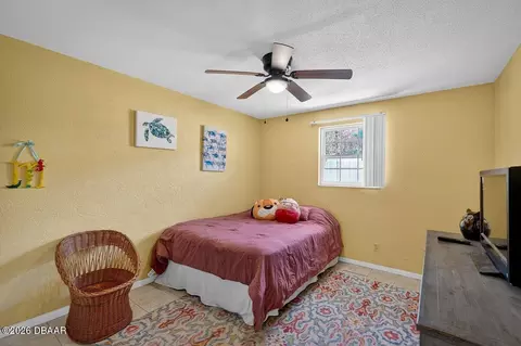 Bedroom - 483 N Halifax Dr, Ormond Beach, FL 32176 photo 7 of 8