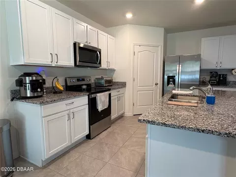 Kitchen - 3019 Staten Dr, Deltona, FL 32738 photo 2 of 5