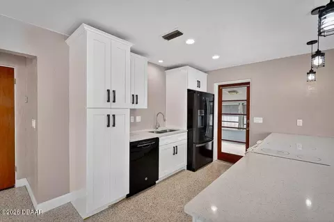Kitchen - 457 Mcintosh Rd, Ormond Beach, FL 32174 photo 2 of 4