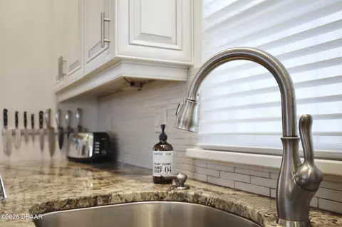 Kitchen - 210 N Riverside Dr, Edgewater, FL 32132 photo 6 of 8