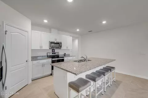 Kitchen - 8 Melogold Dr, Ormond Beach, FL 32174 photo 3 of 7