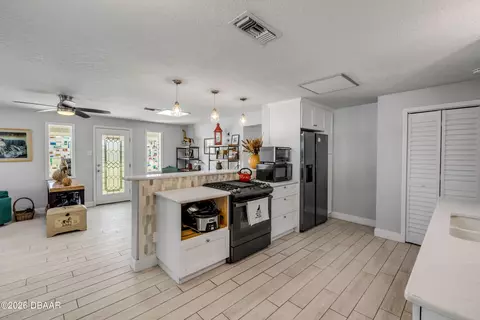 Kitchen - 113 E Pine Bluff St, Edgewater, FL 32132 photo 2 of 3