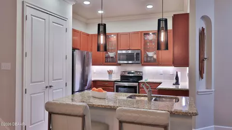 Kitchen - 822 Aldenham Ln, Ormond Beach, FL 32174 photo 3 of 4
