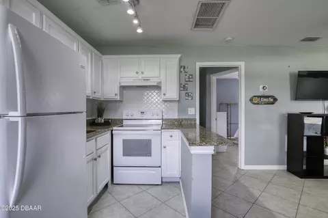Kitchen - 106 Cardinal Dr, Ormond Beach, FL 32176 photo 3 of 5