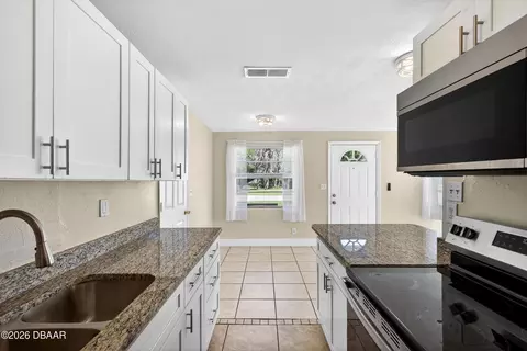 Kitchen - 128 Oakridge Ave, Edgewater, FL 32132 photo 3 of 4