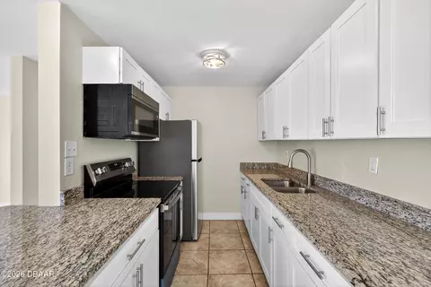 Kitchen - 128 Oakridge Ave, Edgewater, FL 32132 photo 1 of 4