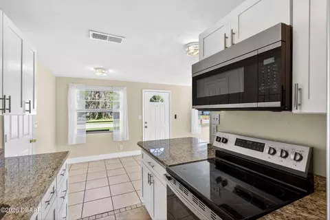 Kitchen - 128 Oakridge Ave, Edgewater, FL 32132 photo 4 of 4