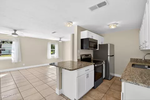 Kitchen - 128 Oakridge Ave, Edgewater, FL 32132 photo 2 of 4