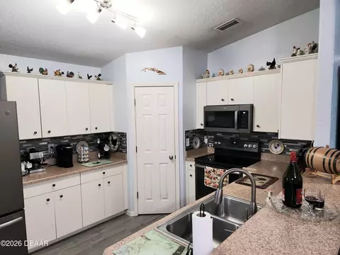 Kitchen - 1976 Myrtle Jo Dr, Ormond Beach, FL 32174 photo 3 of 9