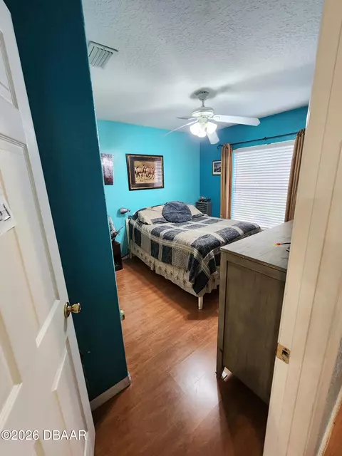 Bedroom - 1976 Myrtle Jo Dr, Ormond Beach, FL 32174 photo 3 of 11