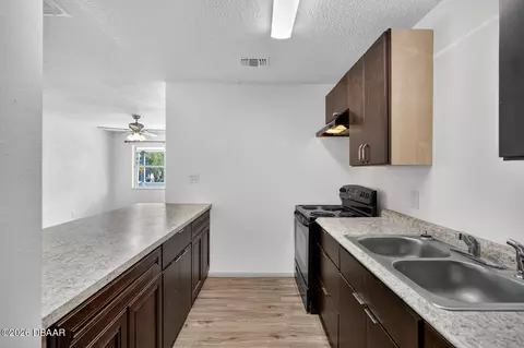 Kitchen - 1060 E Patrick Cir, Daytona Beach, FL 32117 photo 4 of 11