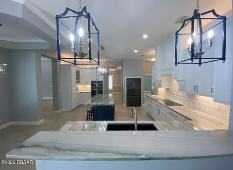 Kitchen - 1452 Pecos Dr, Ormond Beach, FL 32174 photo 6 of 7