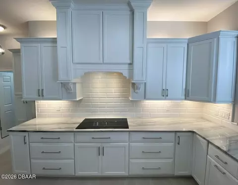 Kitchen - 1452 Pecos Dr, Ormond Beach, FL 32174 photo 2 of 7